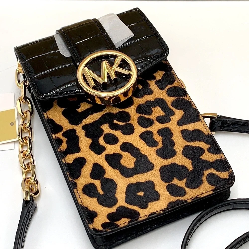 Brand New with Tag
Michael Kors Carmen Small NS Phone XBODY HairCalf
Black Multi - Picture 5 of 16